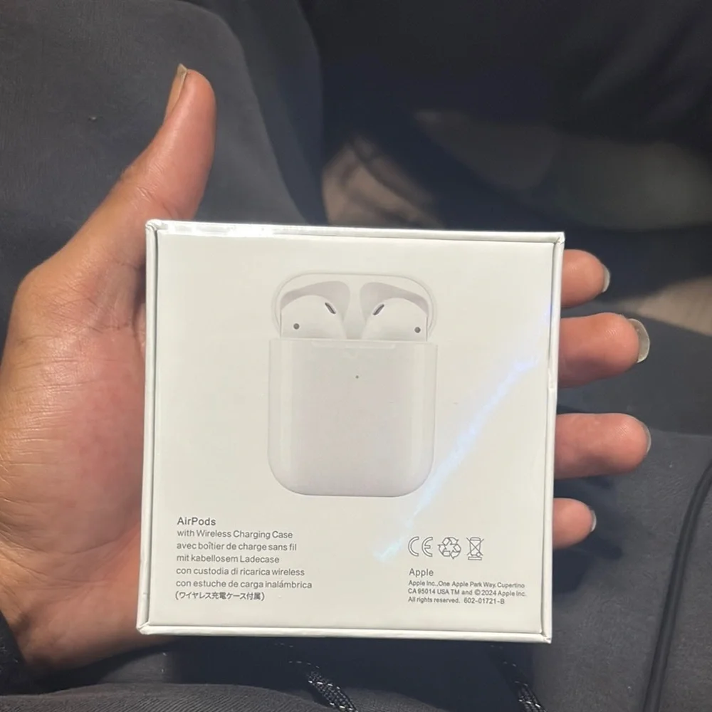 Apple AirPods with Charging Case in White